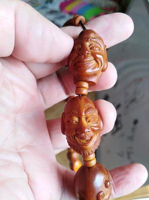 苏工大核精品 单面十八罗汉核雕的艺术魅力